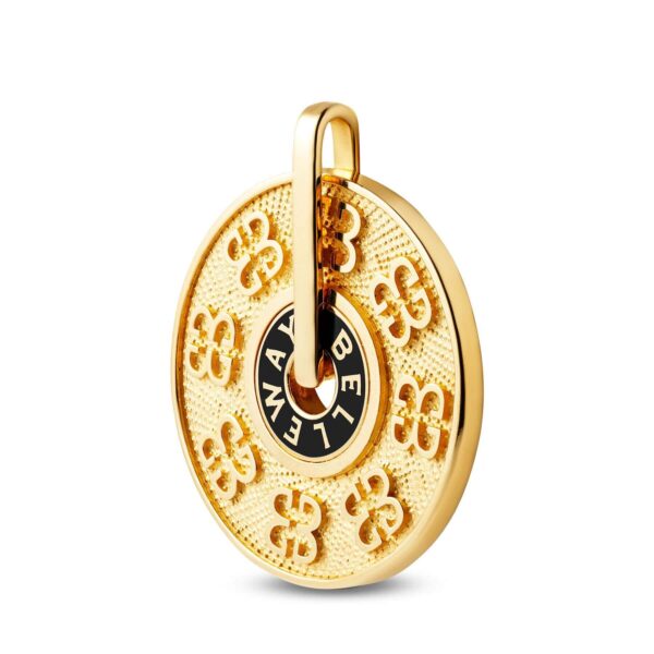 Złota okrągła zawieszka , wewnątrz okręgu emaliowany na czarno owal