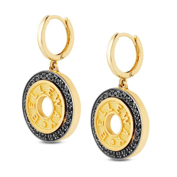 Złote kolczyki wiszące z okrągłą częścią ozdobną ,z czarnymi kamieniami .